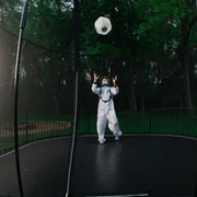 Astronaut Jumping On Springfree Large Square Trampoline S113