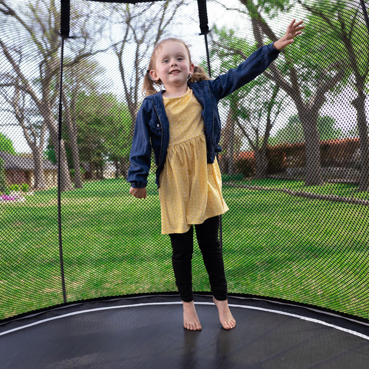Girl Jumping on Springfree Mini Round Trampoline R30